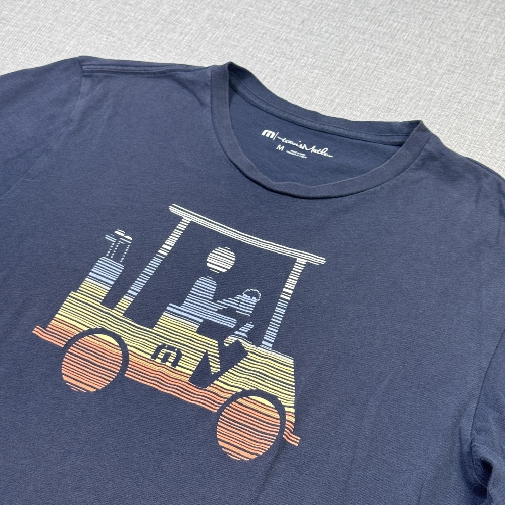 Travis Mathew Golf T-Shirt Mens Medium Blue Short Sleeve‎ Crew Neck Graphic